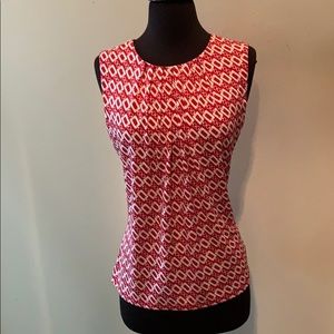 Red & White round neck sleeveless blouse.